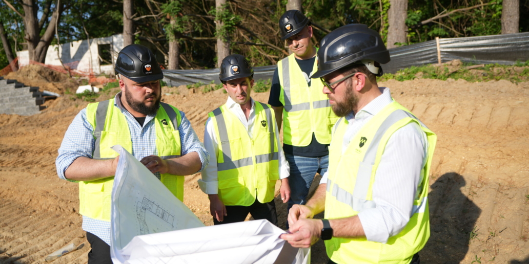 4 people on construction site