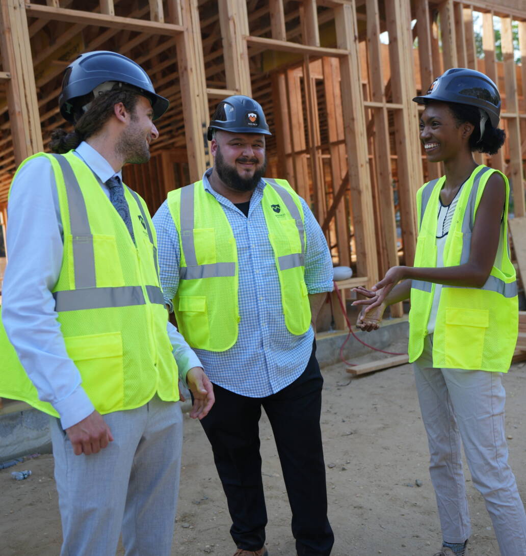 3 people on construction site