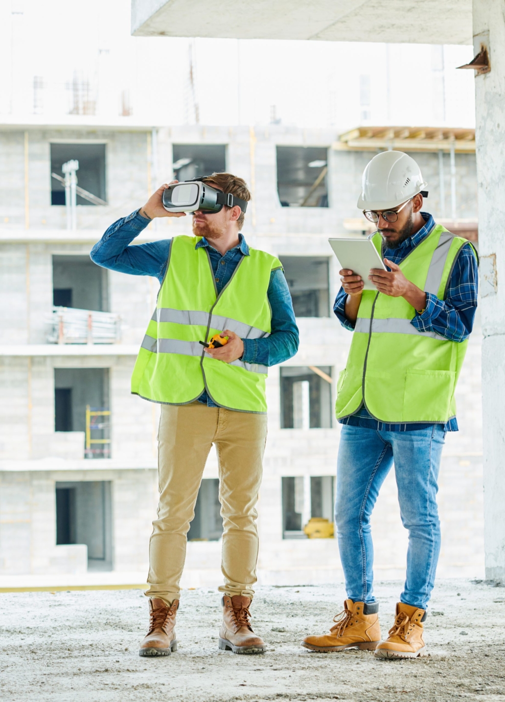 Construction workers looking at site with VR