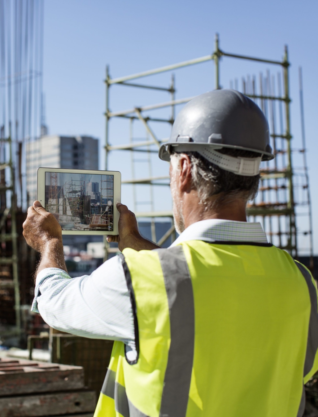 architect photographing construction site