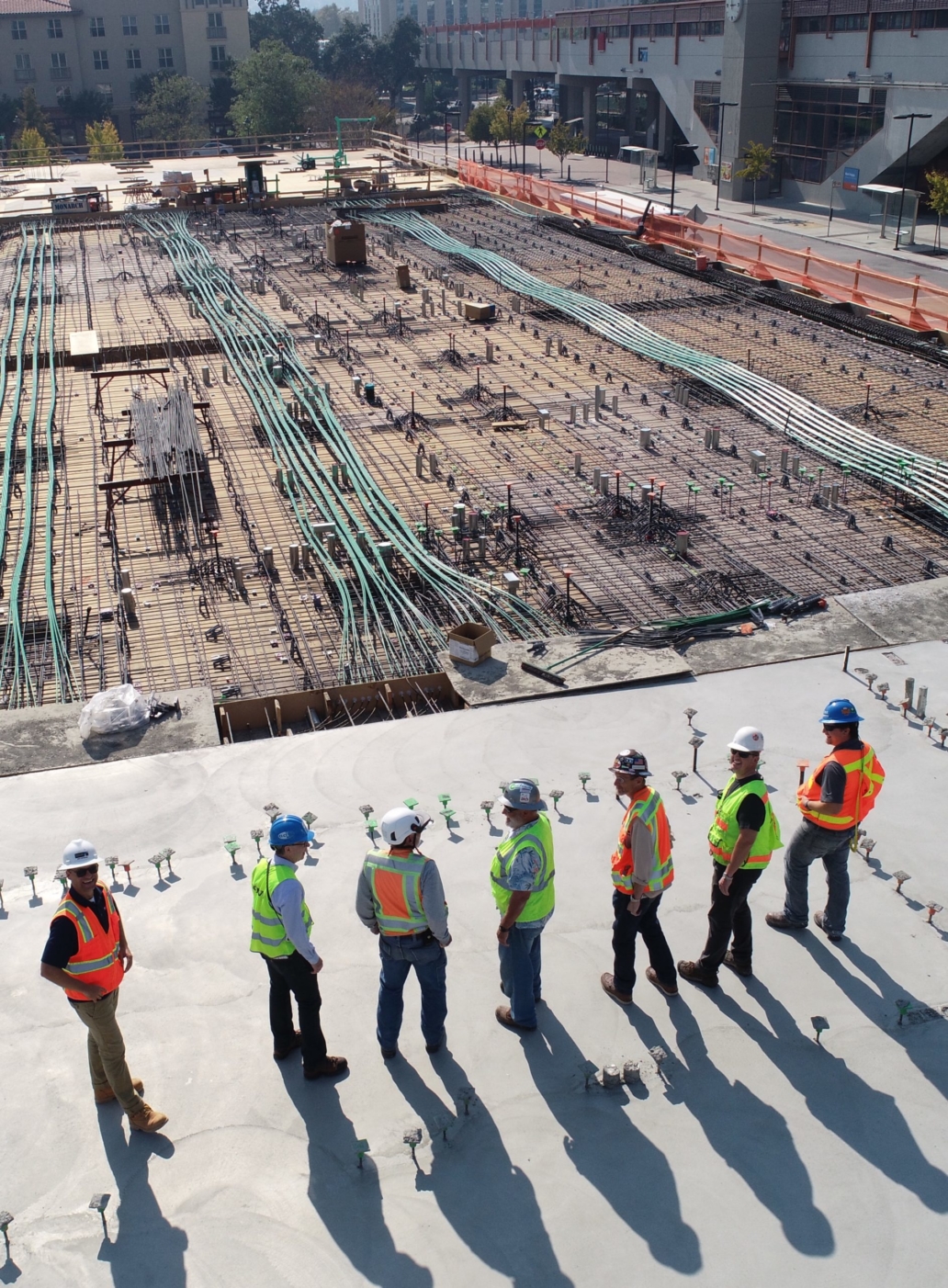 Construction workers looking at site